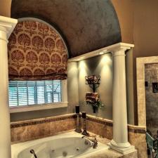 Metallic silver paint and gold barrel ceiling with accent spa colored walls